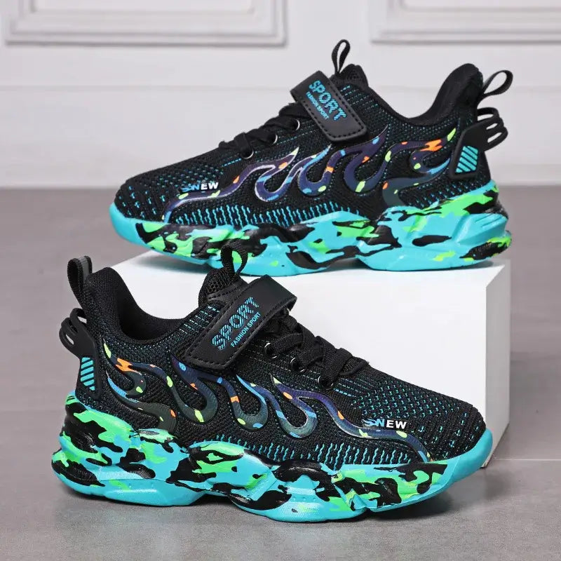 Boys running shoes with vibrant flame design and camouflage sole, perfect for active kids aged 7-12.